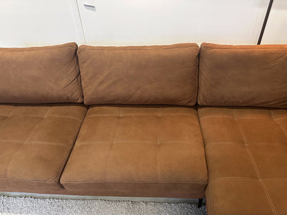 Cognac hoekbank 305x217 cm