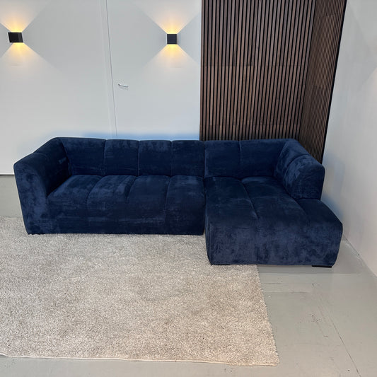 Donker blauwe hoekbank